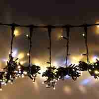 Instalatie Craciun Profesionala de Exterior IP65, Tip Perdea, 22m x 2m, 4400 Led-uri Mari, Alb cald, cu flash, Alimentator 1,5 m, Interconectabila, Fir negru, Flippy