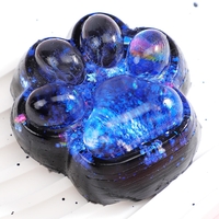 Jucarie Antistres Squishy, Flippy, cu Revenire Lenta, Squeeze Pinch Family, Model Labuta de Pisica cu Sclipici, 6.5x6 cm, 60g, Ambalaj Transparent, Albastru-Negru