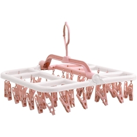 Uscator de Rufe Suspendat Flippy, cu 40 Carlige, Rotire 360 Grade, Protectie Vant, Pliabil, Patrat, Mateiral Plastic, Usor de Depozitat, Multifunctional, 36 x 24 cm, Alb/Roz