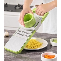 Set Multifunctional din 7 Piese, Flippy, pentru Taierea si Maruntirea Legumelor, Uz Casnic,din Otel Inoxidabil, Gri-Verde