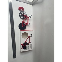 Cutit pizza creativ Flippy, in forma de bicicleta, cu suport pentru cutit, 19 x 12.5 cm, otel/PP, negru