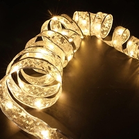 Panglică LED de Crăciun Flippy Aurie, lungime 20 m, 200 LED-uri, Baterii, Alb cald