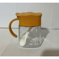 Recipient Condimente, Flippy, din Stilca, 180 ml, cu Maner si Lingurita, 11.3 x 8.2 cm, Capac Ondulat, Galben