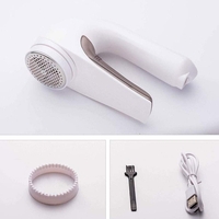 Aparat Pentru Curatat Scame, Par Si Praf, Flippy, Trimmer pentru Diferite Tipuri De Material, Cu Lame Din Otel Inoxidabil, Maner Ergonomic, Incarcare Prin USB, 15x6x9 cm, Alb