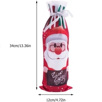 Husa Craciun pentru sticla de vin Flippy, tema Mos Craciun, material textil, 34 cm, multicolor