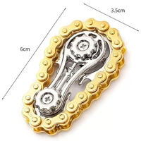 Jucarie Fidget Spinner Premium Anti Stres, Flippy, Giroscop din Aliaj, Jucarie din Metal de decompresie, forma Lant de Angrenaj de Bicicleta, 6 x 3.5 cm, Auriu
