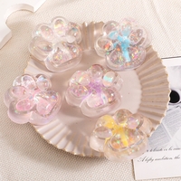Jucarie Antistres Squishy, Flippy, cu Revenire Lenta, Squeeze Pinch Family, Model Cat Paw, 6.5 x 7 cm, din Tpr, 4-6 Ani, Model 2 Flori, Transparent