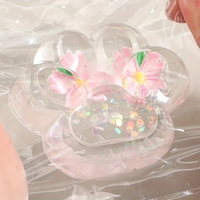 Jucarie Antistres Squishy, Flippy, Labuta de Pisica Pufoasa, cu Revenire Lenta, 7 x 6.5 cm, Model Flori 2, Transparent
