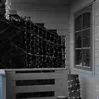 Instalatie Craciun, Tip Perdea, IP44, 11 m x 1 m, 660 LED-uri, Alb rece, 8 jocuri de lumini, Transformator cu telecomanda, Interconectabila, Prelungitor 3 m inclus, Fir transparent, Interior/ Exterior, Flippy