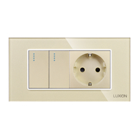 Intrerupator Dublu + Priza cu Rama din Sticla LUXION, Standard Italian, 4M, auriu