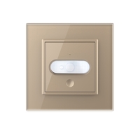 Intrerupator senzor de miscare PIR Livolo cu rama din sticla, auriu