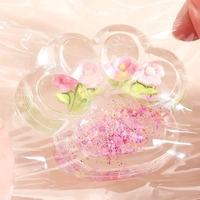 Jucarie Antistres Squishy, Flippy, Labuta de Pisica Pufoasa, cu Revenire Lenta, 7 x 6.5 cm, Model Flori 1, Transparent