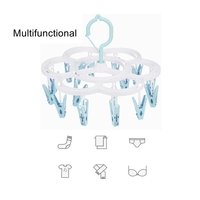 Uscator de Rufe Suspendat Flippy, cu 16 Carlige, Rotire 360 Grade, Mateiral Plastic, Usor de Depozitat, Multifunctional, 26 x 21 cm, Albastru
