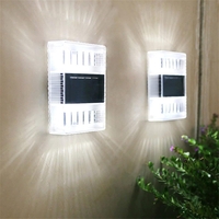 Aplica solara LED pentru Gradina, Flippy, Set 4 Bucati, ABS/Policarbonat, Rezistenta la apa IP65, pentru perete, 1.2V, 600mah, 10x2.5x7 cm, Lumina Alb calda, Transparenta