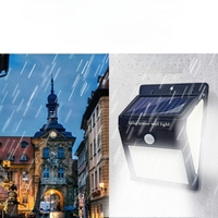 Lampa cu incarcare solara si senzor de miscare pentru exterior, 64 LED cu distanta de inductie, montaj pe perete, fara cabluri, Flippy
