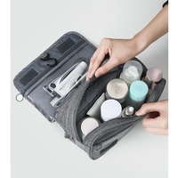 Geanta cosmetice voiaj, Flippy, material panza, impermeabil, 3 compartimente, cu agatatoare, Gri, 47 x 28 x 20 cm