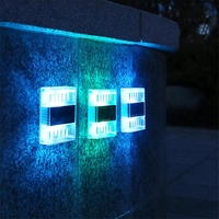 Aplica solara LED pentru Gradina, Flippy, Set 4 Bucati, ABS/Policarbonat, Rezistenta la apa IP65, pentru perete, 1.2V, 600mah, 10x2.5x7 cm, Lumina Alb calda, Transparenta