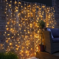 Instalatie Craciun, Tip Perdea, IP44, 6 m x 3 m, 480 LED-uri, Alb Cald, cu 8 jocuri de lumini, 31 V, 9W, Interconectabila, Prelungitor 3 m inclus, Fir transparent, Interior/ Exterior, Vafy