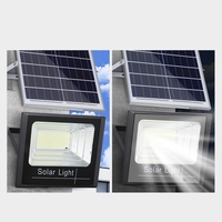 Proiector LED SMD 300W cu incarcare solara Flippy, panou solar, cu telecomanda, suport prindere, material ABS, 14AH, 1032 LED-uri, 5 m cablu inclus, 1019Lm, 36x32 cm, negru