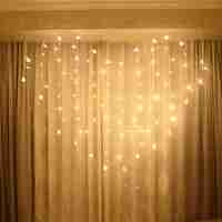 Instalatie Craciun, 2 x 1.5 m, 128 LED-uri, alb-cald, tip perdea, in forma de inima, telecomanda cu 8 functii, Vafy