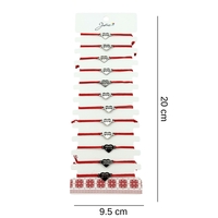 Bratara Martisor pentru Dama, Jolie, Model Inima cu Text Mama, Set 12 bucati, Pandativ Argintiu din Inox cu Snur Rosu Ajustabil