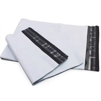 Set 500 Pungi Curierat, 500x700x40mm, Grosime 50 Microni, Banda Adeziva pentru Sigilare, Alb la Exterior, Negru la Interior