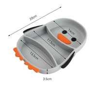 Set diversificare bebelusi Flippy, din silicon, 23.5 x 12.5 cm, 1 farfurie compartimentata in forma de pinguin, lingurita si furculita, pai, perie pai, fara alergeni, ventuza fixare, forma creativa, gri