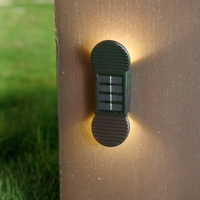 Aplica solara LED, Flippy, Set 4 Bucati, ABS/Policarbonat, rezistenta la apa IP65, 2 LED-uri SMD, pentru perete, scari, 1.2V, 600mah, 16 x 5.9 x 3.3 cm, Lumina Alb calda, Negru