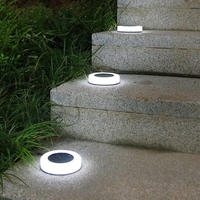 Set 4 Lampi Solare Led pentru Gradina, Flippy, Model Cerc, 10.5 x 2.4 cm, Buton On-Off, Alb Rece, Negru/Alb