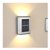 Aplica solara LED pentru Gradina, Flippy, Set 2 Bucati, ABS/Policarbonat, rezistenta la apa IP65, pentru trepte, borduri, terasa, 1.2V, 600mah, 10 x 7.5 x 3 cm, Lumina Alb Calda, Negru