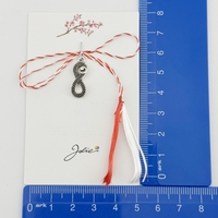 Martisor Traditional, Jolie, Model Infinit, cu Snur Impletit Alb/Rosu, 8.5 x 5.5 cm. Argintiu