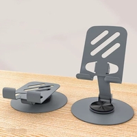 Suport rotativ pentru telefon, Flippy, Complet Metalic, Pliabil, Design Modern pentru Desktop, Multifunctional, Compatibil cu Tableta, 10.5 x 9 x 9 cm, 80 g, Gri