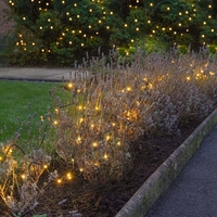 Instalatie de Craciun Liniara Yoto, 22 m, din care 1 m Prelungitor 220V, 300 LED, 8 jocuri de lumini, Controler, Utilizare Interior/Exterior, Fir Negru, Alb Cald