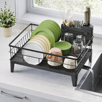 SONGMICS Suport vase metalic, cu tava si scurgere mobila direct in chiuveta, 31x42x19 cm, negru