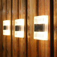 Aplica solara LED pentru Gradina, Flippy, Set 4 Bucati, ABS/Policarbonat, Rezistenta la apa IP65, pentru perete, 1.2V, 600mah, 10x2.5x7 cm, Lumina Alb calda, Transparenta