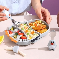 Set diversificare bebelusi Flippy, din silicon, 23.5 x 12.5 cm, 1 farfurie compartimentata in forma de pinguin, lingurita si furculita, pai, perie pai, fara alergeni, ventuza fixare, forma creativa, gri