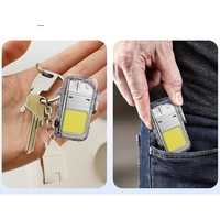 Lanterna Tip Breloc cu Bricheta, Vafy, Impermeabila, 3 Moduri Iluminare, 300 mAh, Incarcare USB-C, COB, Raza de Actiune 50 - 100 m, 7.4 x 4.9 x 1.7 cm, Argintiu