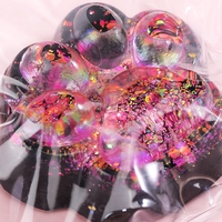 Jucarie Antistres Squishy, Flippy, cu Revenire Lenta, Squeeze Pinch Family, Model Labuta de Pisica cu Sclipici, 6.5x6 cm, 60g, Ambalaj Transparent, Roz-Negru