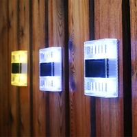 Aplica solara LED pentru Gradina, Flippy, Set 4 Bucati, ABS/Policarbonat, Rezistenta la apa IP65, pentru perete, 1.2V, 600mah, 10x2.5x7 cm, Lumina Alb calda, Transparenta