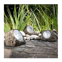 Lampa solara LED decorativa pentru gradina Flippy, imitatie piatra, lumina puternica 4 LED-uri, 12 x 15 cm, material ABS, baterie Ni-MH, 600 mAh, panou solar 2V, lumina alb rece, gri