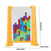Joc de inteligenta Tetris puzzle tangram Flippy, 70 de piese multicolore, 3D, montessori, interactiv, din plastic, zar inclus, sac depozitare piese, varsta peste 6 ani, 23 x 19.8 x 5 cm, cadru galben