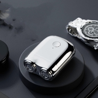 Mini Aparat de Ras Electric, Vafy, din ABS cu Fibra de Carbon, Portabil, Cap Rotativ Detasabil cu 2 Lame de Otel, Rezistent la Apa, Incarcare Type-C, Autonomie 45 min, Argintiu