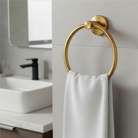 Suport metalic tip inel pentru prosop, inox cu finisaj lucios, diametru 17 cm, accesorii montaj incluse, auriu