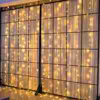 Instalatie Craciun, Tip Perdea, IP44, 10 m x 1 m, 600 LED-uri, Alb cald, 8 jocuri de lumini, Transformator, Interconectabila, Prelungitor 5 m inclus, Fir transparent, Interior/ Exterior, Vafy