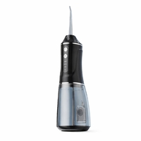 Irigator Bucal Electric, Flippy, Portabil, Dus Bucal pentru Curatare, Indepartare Tartru, 4 Capete, 25 x 8 x 8 cm, Negru