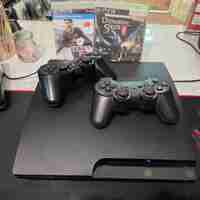 Playstation 3 Slim/ Cipovan/2 Dzojstika/12 Igrica