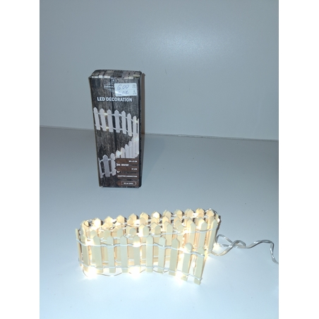 Коледни лампички ограда