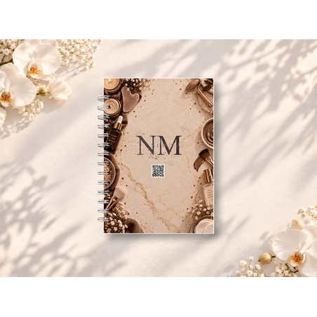 Корица на NMhandmade седмичен график 1 за козметици, колекция COCOA 2027, със спирално подвързване, представена върху светъл фон с декоративни цветя.