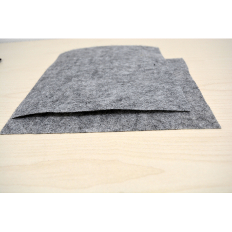 Приклейка войлочной основы на ковры