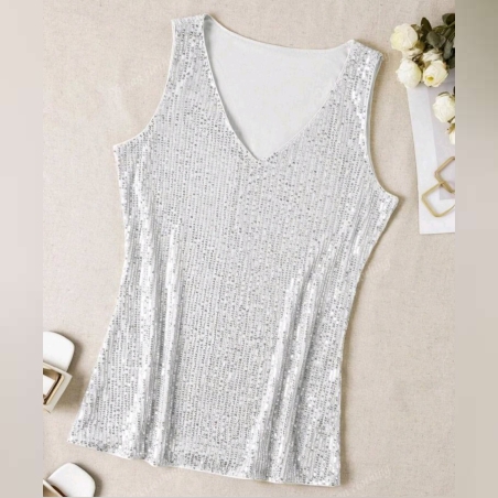 Дамски потник сVобразно деколте от сребристи пайети